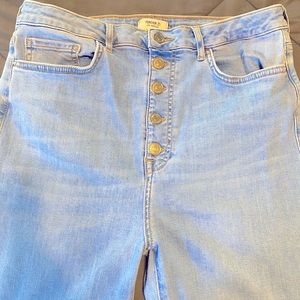 High waisted light blue jeans